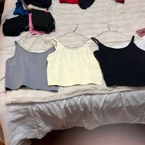 Three tank tops